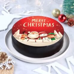 Santa chocolate photo cake with edible Santa image and festive decorations.