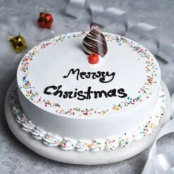 Christmas Vanilla Cake with festive decorations - perfect holiday dessert.