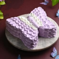 Creamy Butterfly Cake with delicate butterfly design – perfect for birthdays and special occasions.