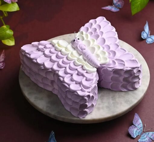 Creamy Butterfly Cake with delicate butterfly design – perfect for birthdays and special occasions.