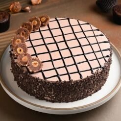 Ferrero Rocher Chocolate Cake with hazelnut decoration – perfect for birthdays and special occasions.