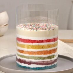 Colorful Rainbow Ganache Pull Me Up Cake – Interactive birthday cake with ganache layers.