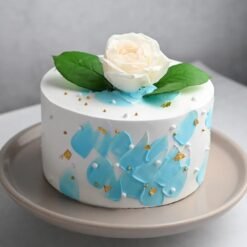 Elegant Aqua Blue Cream Cake with smooth frosting and a gorgeous blue finish