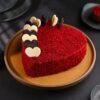 Beautiful Red Velvet Heart Cake with creamy white frosting and a soft, velvety texture