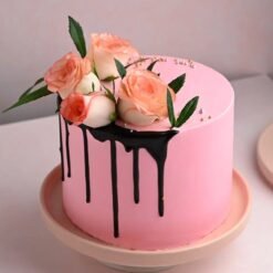 Floral Enchanting Pink Rose Cake with pink rose accents, ideal for weddings and celebrations