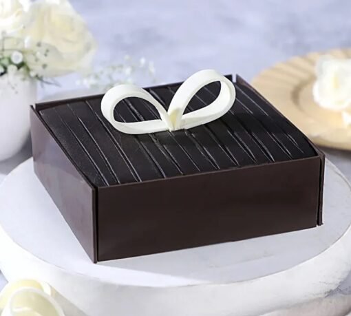 Luxurious Truffle Indulgence Cake – a rich chocolate dessert perfect for special occasions