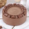 Delicious Kit Kat Crunch Cake featuring layers of cream and Kit Kat chocolate bars