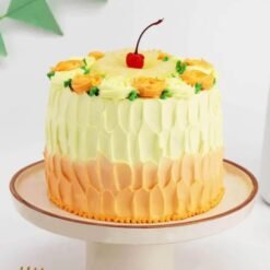 Delicious creamy pineapple cake with fresh tropical fruit and smooth cream