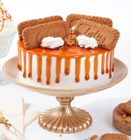 Irresistible Lotus Caramel Cake featuring crunchy Lotus biscuits and creamy caramel