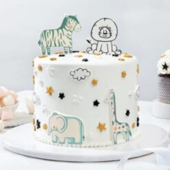 Semi-fondant cake with whimsical animal designs, ideal for children's parties