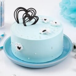 Close-up of Pearly Blue Cream Cake, featuring luxurious blue cream and decorative details