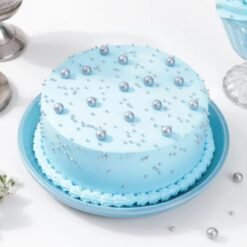 Blue Pearls Cake with elegant blue pearl decorations on a smooth cake surface