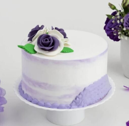Beautiful Purple Passion Cake, decorated with rich purple icing and intricate details