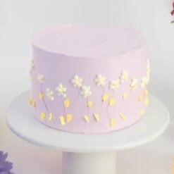 Pink Fleurs Cake decorated with delicate pink flowers, a stunning choice for any special occasion