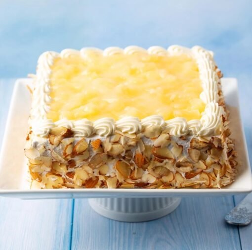 Tropical Fresh Cream Pineapple Cake – A sweet and creamy dessert perfect for celebrations.