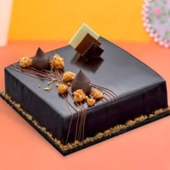 Luxurious Belgium Chocolate Truffle Cake topped with velvety chocolate ganache