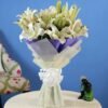 Whimsical Lilies Symphony – a graceful bouquet of fresh lilies, radiating beauty and sophistication.