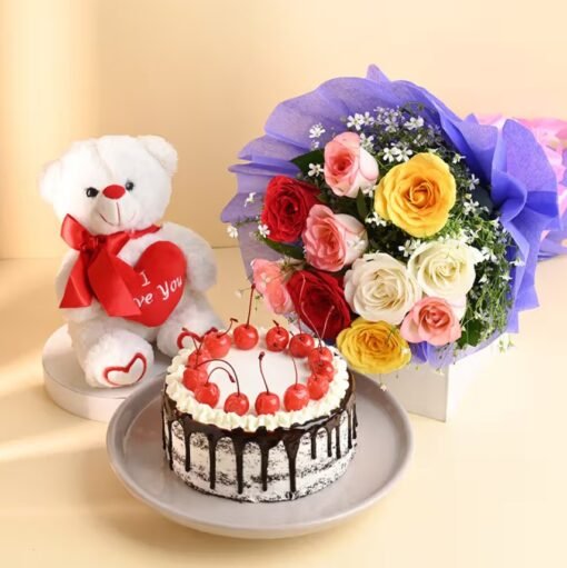 A charming gift set featuring a beautiful floral arrangement, a soft teddy bear, and a delectable cake, perfect for special occasions.
