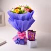 Elegant bouquet of fresh roses paired with indulgent chocolates, a luxurious treat for heartfelt gifting and sweet celebrations.