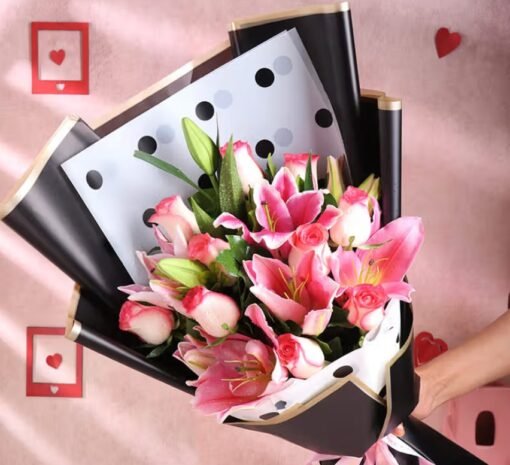 Blush Lily & Roses Bliss bouquet with soft pink lilies and roses, exuding elegance and romance.