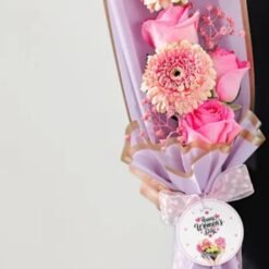 A dazzling bouquet of vibrant blooms, beautifully arranged to create a harmonious blend of color and charm.
