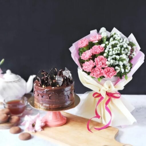 Elegant pink flower bouquet with a delectable hazelnut cake, perfect for birthdays, anniversaries, and special celebrations.