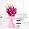 Elegant Purple Orchids with a delicious Black Forest Cake, a perfect gift for birthdays, anniversaries, and romantic surprises.