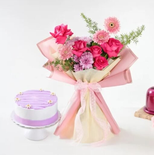 A delightful gift set featuring a beautiful bouquet of fresh blooms and a scrumptious cake, perfect for celebrations and heartfelt surprises.