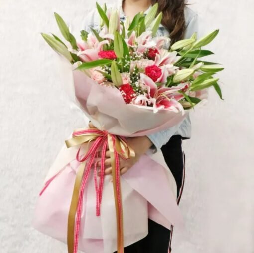 Beautiful Radiant Lily Harmony bouquet featuring fresh, vibrant lilies, exuding grace and harmony for special celebrations and heartfelt gifting.
