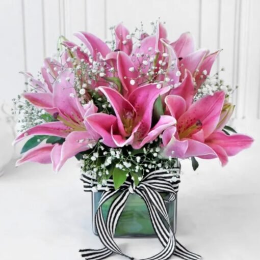 Elegant bouquet of enchanting lilies, radiating grace and charm – an ideal floral gift for celebrations, anniversaries, and heartfelt moments.