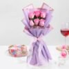 A luxurious gift set featuring fresh red roses and a delicious cake, ideal for romantic celebrations and heartfelt surprises.