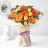 Vibrant Harmony Floral Arrangement featuring a lively mix of fresh, radiant flowers, elegantly arranged to add charm and joy to any occasion.