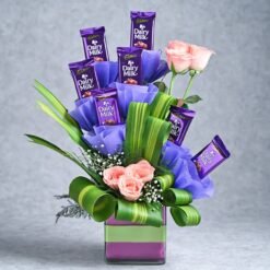 Elegant gift combo featuring premium chocolates and fresh velvety roses, ideal for anniversaries, romantic occasions, and heartfelt celebrations.