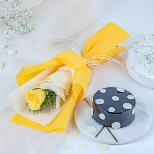 Yellow Rose & Truffle Combo featuring a vibrant bouquet of yellow roses and a decadent truffle cake, perfect for special celebrations.
