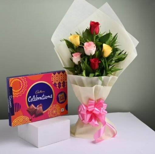 Elegant floral arrangement with delightful treats – an ideal gift for special occasions, spreading love and joy with beauty and sweetness.