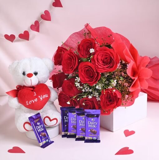 Romantic gift set featuring vibrant flowers, delicious chocolates, and a soft teddy bear – an ideal surprise for loved ones.