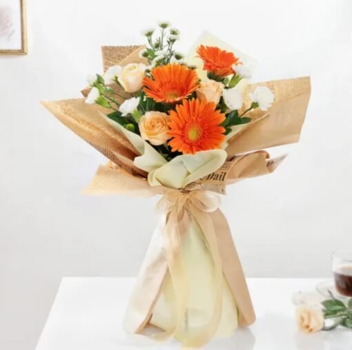 A beautiful bouquet of lush roses and gerberas, elegantly arranged to create a harmonious floral symphony for any special occasion.