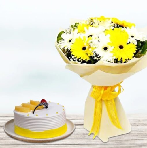 Colorful tropical flowers with a delectable cake, a perfect gift combo for birthdays, anniversaries, and special celebrations.