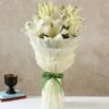 Elegant White Lily Bouquet with fresh, fragrant lilies, symbolizing purity and sophistication.