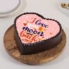 Romantic moon-themed cake with “I Love You to the Moon and Back” message in fondant or icing.