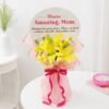 Mother's Day bouquet of fresh yellow lilies wrapped beautifully.