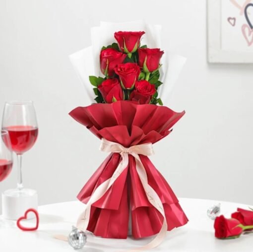 Charming bouquet of classic red roses arranged beautifully, symbolizing eternal love and timeless elegance.