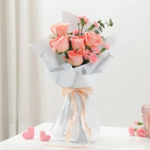 A breathtaking Ethereal Beauty Bloom Bouquet featuring delicate fresh flowers, crafted to bring charm and sophistication to any celebration.