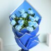 Elegant mixed flower bouquet with pastel hues and lush blooms, styled in a luxurious arrangement.