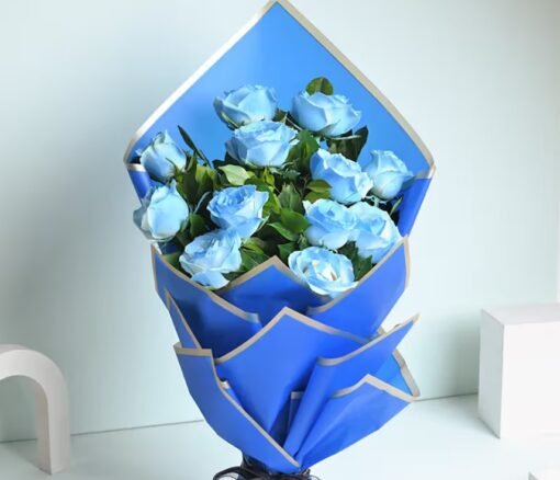 Elegant mixed flower bouquet with pastel hues and lush blooms, styled in a luxurious arrangement.