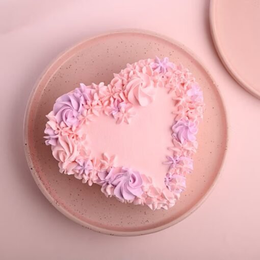 Elegant Heartfelt Delight Cake adorned with love-themed decorations.