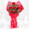 Ruby red roses bouquet arranged to express deep love and elegance, ideal for anniversaries or romantic gifts.