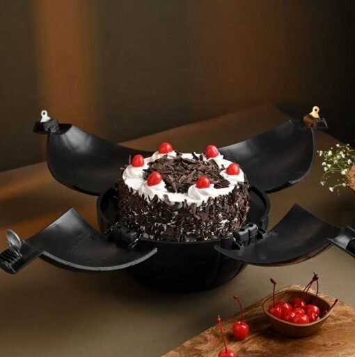 Black Forest cake with whipped cream, cherries, and chocolate shavings.