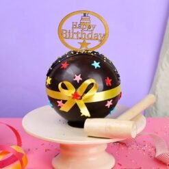 Magical Smash Pinata Cake with pastel design and hidden treats inside.