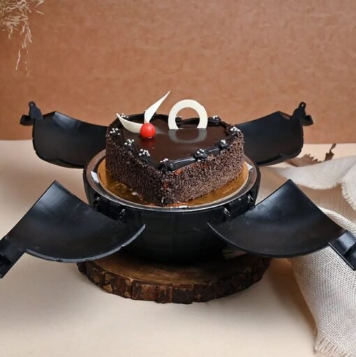 Heart-shaped chocolate bomb cake filled with love-themed chocolate treats.
